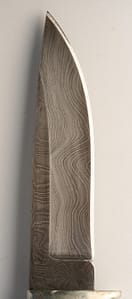 closeup, damascened lines on steel knife blade