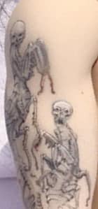 2 bugs tattooed on arm