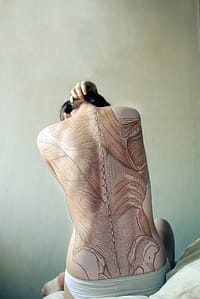 anatomical detail drawn on woman's back