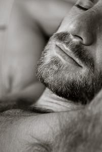 chin and arms, bearded man asleep