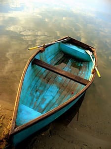 blue boat with oars