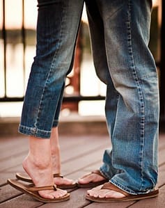 couple in sandals and jeans