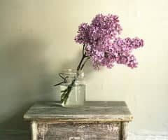 flowers in a jar on a table
