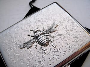 bee bas-relief on silver floral figures, cigarette case