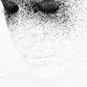 woman with eyes closed, done in stippled ink