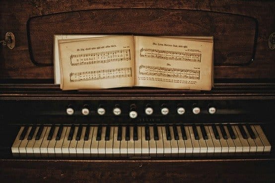 antique music on organ keyboard